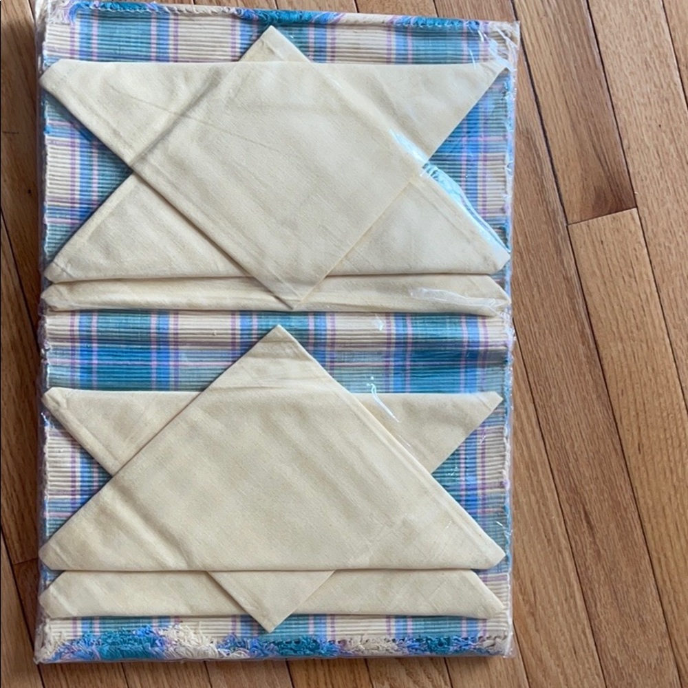Plaid fabric table place mats and napkins.
